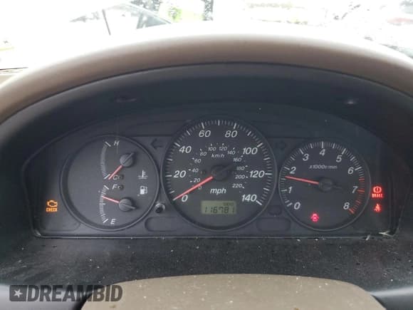 ✅ 2000 Mazda Protege DX • VIN: JM1BJ2223Y0295154 • Lot: 79511954. Wystawiony na Copart z przebiegiem 116 781 mil. Bezpłatny archiwum sprzedaży aukcyjnych z USA i szczegółowy raport historii pojazdu na DreamBid. Zdjęcie 9.