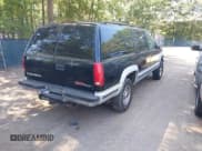 ✅ 1995 GMC Suburban • VIN: 1GKGK26N9SJ707428 • Lot: 43123104. Listed on IAAI with 328,915 mi. Free auction sales archive from the USA and detailed vehicle history report at DreamBid. Image 4.