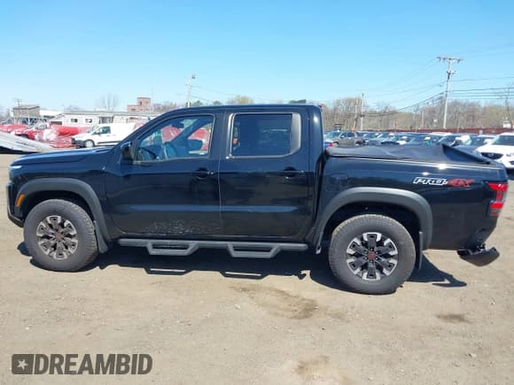✅ 2024 Nissan Frontier SV • VIN: 1N6ED1EK8RN656812 • Lot: 42071048. Listed on IAAI with 18,276 mi. Free auction sales archive from the USA and detailed vehicle history report at DreamBid. Image 14.