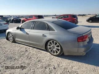 ✅ 2012 Audi A8 • VIN: WAUAVAFD9CN034903 • Lot: 86818705. Listed on Copart with 174,494 mi. Free auction sales archive from the USA and detailed vehicle history report at DreamBid. Image 2.