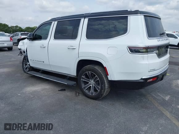 ✅ 2023 Jeep Grand Wagoneer • VIN: 1C4SJVEJ7PS570435 • Lot: 41857510. Listed on IAAI with Not provided. Free auction sales archive from the USA and detailed vehicle history report at DreamBid. Image 3.
