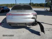 ✅ 2016 Lincoln MKZ • VIN: 3LN6L2G96GR630323 • Lot: 86862705. Wystawiony na Copart z przebiegiem 153 378 mil. Bezpłatny archiwum sprzedaży aukcyjnych z USA i szczegółowy raport historii pojazdu na DreamBid. Zdjęcie 6.