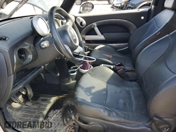 ✅ 2005 MINI Hardtop S • VIN: WMWRE334X5TD95254 • Лот: 94169795. Опубликован ранее на Copart с пробегом 76 263 миль. Бесплатный доступ к архиву аукционных продаж из США и подробный отчёт об истории автомобиля на DreamBid. Изображение 7.