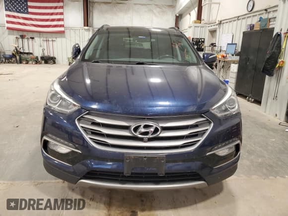 ✅ 2018 Hyundai Santa Fe Ultimate • VIN: 5XYZWDLA1JG507521 • Лот: 91259025. Опубликован ранее на Copart с пробегом 143 697 миль. Бесплатный доступ к архиву аукционных продаж из США и подробный отчёт об истории автомобиля на DreamBid. Изображение 5.