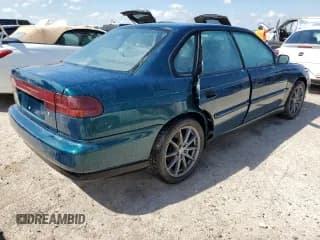 ✅ 1998 Subaru Legacy L 30th Anniversary • VIN: 4S3BD4357W6207891 • Lot: 73790224. Listed on Copart with 180,020 mi. Free auction sales archive from the USA and detailed vehicle history report at DreamBid. Image 3.