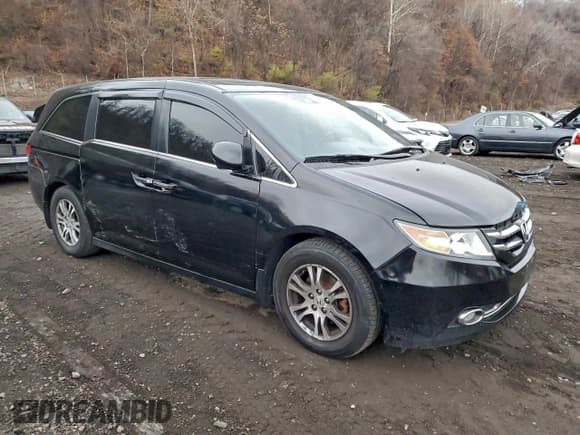 ✅ 2014 Honda Odyssey EX-L • VIN: 5FNRL5H61EB129538 • Lot: 94267145. Listed on Copart with 185,108 mi. Free auction sales archive from the USA and detailed vehicle history report at DreamBid. Image 4.
