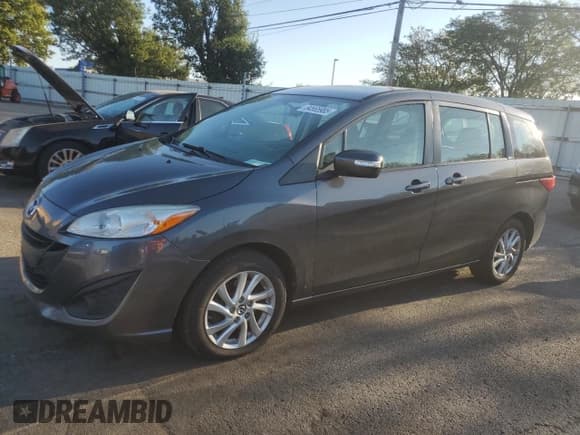 ✅ 2014 Mazda 5 Sport • VIN: JM1CW2BL8E0163310 • Lot: 84565985. Listed on Copart with 145,509 mi. Free auction sales archive from the USA and detailed vehicle history report at DreamBid. Image 1.