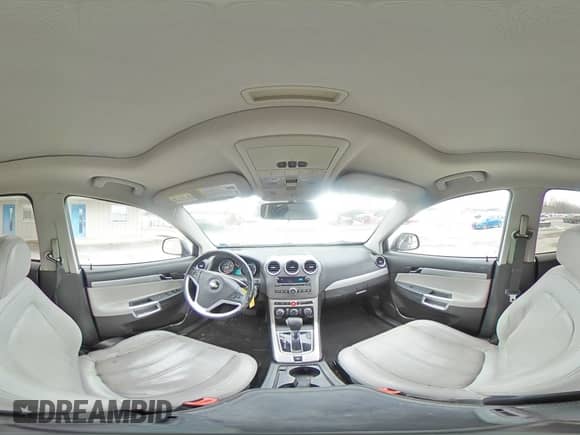 2012 Chevrolet Captiva Sport LTZ z VIN 3GNFL4E5XCS624082, wystawiony jako Copart lot #83013754 z przebiegiem 107 037 mil mil oraz Szkoda całkowita • Salvage title. Historia ofert i sprzedaży dostępna na DreamBid. Obrazek 15.