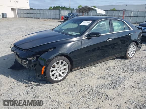 ✅ 2014 Cadillac CTS Luxury RWD • VIN: 1G6AR5SX9E0127759 • Lot: 42273609. Listed on IAAI with 123,885 mi. Free auction sales archive from the USA and detailed vehicle history report at DreamBid. Image 2.