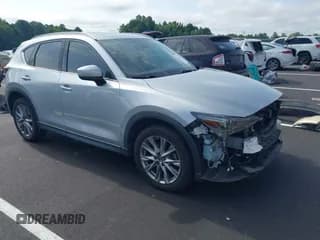 ✅ 2019 Mazda CX-5 Grand Touring Reserve • VIN: JM3KFBDY7K0693548 • Lot: 43017493. Listed on IAAI with 33,192 mi. Free auction sales archive from the USA and detailed vehicle history report at DreamBid. Image 1.