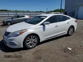 2013 Hyundai Azera z VIN KMHFG4JG4DA223002, wystawiony jako Copart lot #54886085 z przebiegiem 164 125 mil mil oraz Czysty tytuł • Clean title. Historia ofert i sprzedaży dostępna na DreamBid. Obrazek 1.