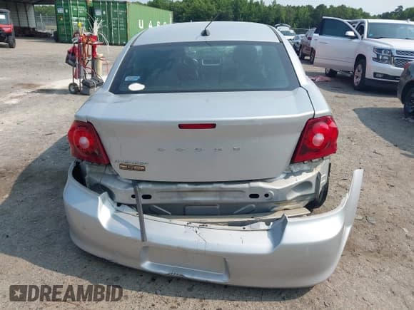 ✅ 2012 Dodge Avenger SXT • VIN: 1C3CDZCB9CN209185 • Lot: 42416015. Listed on IAAI with 243,021 mi. Free auction sales archive from the USA and detailed vehicle history report at DreamBid. Image 17.