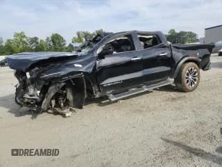 ✅ 2023 GMC Canyon 4WD Denali • VIN: 1GTP6FEK6P1263009 • Lot: 70935815. Wystawiony na Copart z przebiegiem Nie podano. Bezpłatny archiwum sprzedaży aukcyjnych z USA i szczegółowy raport historii pojazdu na DreamBid. Zdjęcie 1.