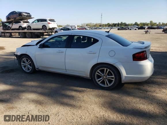 2012 Dodge Avenger SXT with VIN 1C3CDZCB2CN270507, listed as a Copart auction lot 82173325 with 173,955 mi miles and Salvage title. Bid and sale history available at DreamBid. Image 2.