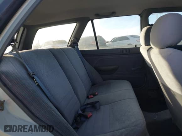 ✅ 1995 Ford Escort • VIN: 3FASP15J4SR123210 • Lot: 41397803. Wystawiony na IAAI z przebiegiem 72 765 mil. Bezpłatny archiwum sprzedaży aukcyjnych z USA i szczegółowy raport historii pojazdu na DreamBid. Zdjęcie 8.