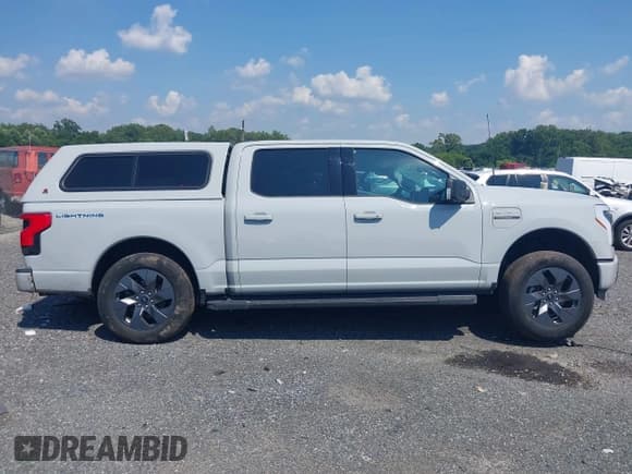 ✅ 2023 Ford F-150 Lightning Pro • VIN: 1FT6W1EVXPWG35446 • Лот: 42750723. Опубликован ранее на IAAI с пробегом 45 348 миль. Бесплатный доступ к архиву аукционных продаж из США и подробный отчёт об истории автомобиля на DreamBid. Изображение 13.