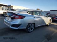 ✅ 2021 Honda Clarity • VIN: JHMZC5F15MC001126 • Lot: 89397385. Listed on Copart with 29,584 mi. Free auction sales archive from the USA and detailed vehicle history report at DreamBid. Image 3.