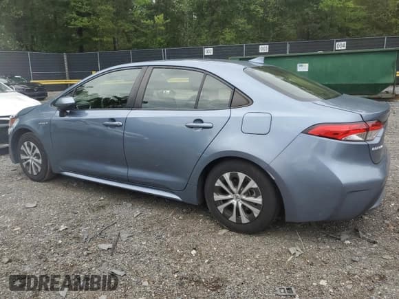 ✅ 2021 Toyota Corolla Hybrid LE • VIN: JTDEAMDE5MJ015206 • Лот: 84870535. Опубликован ранее на Copart с пробегом 67 752 миль. Бесплатный доступ к архиву аукционных продаж из США и подробный отчёт об истории автомобиля на DreamBid. Изображение 2.