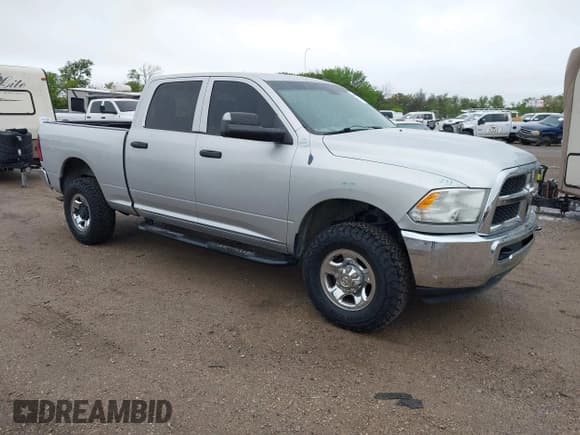 ✅ 2013 Ram 2500 Tradesman • VIN: 3C6TR5CT1DG562584 • Lot: 41958471. Listed on IAAI with 185,426 mi. Free auction sales archive from the USA and detailed vehicle history report at DreamBid. Image 1.