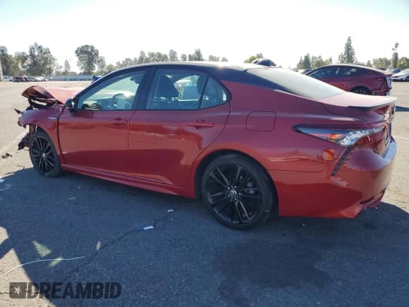 2021 Toyota Camry Hybrid XSE с VIN 4T1K31AK6MU022259, выставлен на аукционе Copart как лот 70696655 с пробегом 155 767 миль миль и Списание • Salvage title. История ставок и продаж доступна на DreamBid. Изображение 2.