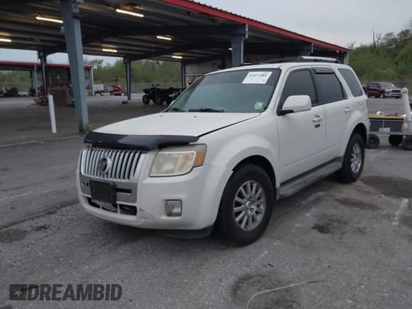 ✅ 2010 Mercury Mariner Premier • VIN: 4M2CN8HG2AKJ06271 • Lot: 41871088. Listed on IAAI with 248,159 mi. Free auction sales archive from the USA and detailed vehicle history report at DreamBid. Image 2.