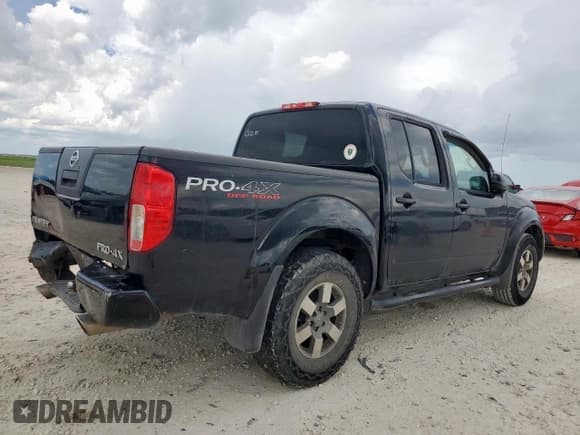 ✅ 2012 Nissan Frontier Pro-4X • VIN: 1N6AD0EV4CC471310 • Lot: 62752585. Listed on Copart with 167,990 mi. Free auction sales archive from the USA and detailed vehicle history report at DreamBid. Image 3.