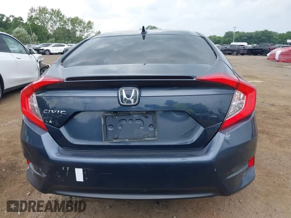 ✅ 2018 Honda Civic EX-T • VIN: JHMFC1F34JX037438 • Lot: 42887459. Listed on IAAI with 107,302 mi. Free auction sales archive from the USA and detailed vehicle history report at DreamBid. Image 16.