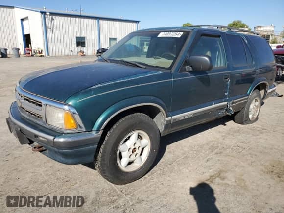 1996 Chevrolet Blazer LT с VIN 1GNDT13W0TK159549, выставлен на аукционе Copart как лот 74097264 с пробегом 141 226 миль миль и Чистый • Clean title. История ставок и продаж доступна на DreamBid. Изображение 1.