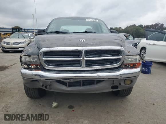 2003 Dodge Dakota SLT z VIN 1D7HL48N93S225937, wystawiony jako Copart lot #72817914 z przebiegiem 168 204 mil mil oraz Czysty tytuł • Clean title. Historia ofert i sprzedaży dostępna na DreamBid. Obrazek 5.