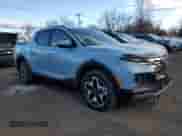 2024 Hyundai Santa Cruz Limited z VIN 5NTJEDAF7RH100548, wystawiony jako Copart lot #88242865 z przebiegiem 4 696 mil mil oraz Szkoda całkowita • Salvage title. Historia ofert i sprzedaży dostępna na DreamBid. Obrazek 4.