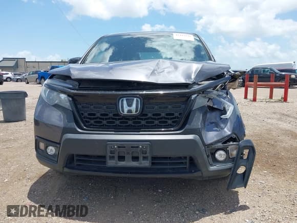 ✅ 2021 Honda Passport EX-L • VIN: 5FNYF8H52MB024467 • Lot: 42427539. Listed on IAAI with 75,652 mi. Free auction sales archive from the USA and detailed vehicle history report at DreamBid. Image 12.