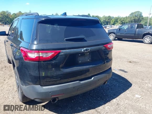 ✅ 2021 Chevrolet Traverse RS • VIN: 1GNERJKW3MJ218735 • Lot: 43234288. Listed on IAAI with 63,109 mi. Free auction sales archive from the USA and detailed vehicle history report at DreamBid. Image 16.