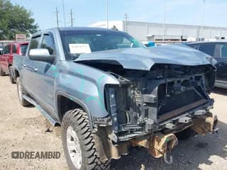 ✅ 2015 GMC Sierra 1500 SLT • VIN: 3GTU2VEC2FG359463 • Lot: 42852471. Listed on IAAI with 201,204 mi. Free auction sales archive from the USA and detailed vehicle history report at DreamBid. Image 1.