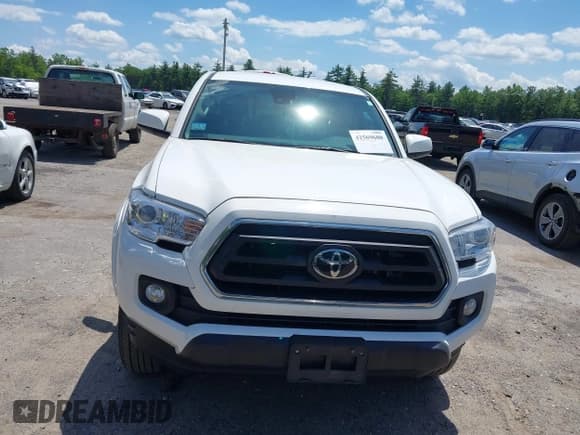 ✅ 2023 Toyota Tacoma SR • VIN: 3TMCZ5AN7PM554959 • Лот: 42569680. Опубликован ранее на IAAI с пробегом 31 138 миль. Бесплатный доступ к архиву аукционных продаж из США и подробный отчёт об истории автомобиля на DreamBid. Изображение 12.