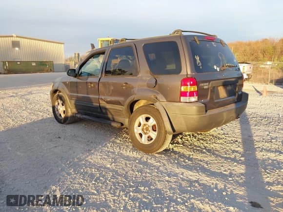 ✅ 2002 Ford Escape XLT Choice • VIN: 1FMYU03112KE00910 • Lot: 43698982. Listed on IAAI with 182,906 mi. Free auction sales archive from the USA and detailed vehicle history report at DreamBid. Image 3.