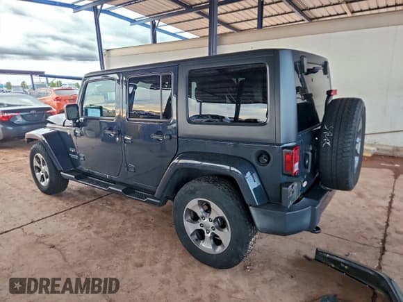 ✅ 2017 Jeep Wrangler Unlimited Sahara • VIN: 1C4BJWEG7HL515781 • Lot: 93571515. Listed on Copart with 102,446 mi. Free auction sales archive from the USA and detailed vehicle history report at DreamBid. Image 2.
