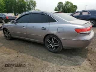 2006 Hyundai Azera SE с VIN KMHFC46F46A105028, выставлен на аукционе Copart как лот 59569815 с пробегом 219 201 миль миль и Списание • Salvage title. История ставок и продаж доступна на DreamBid. Изображение 2.
