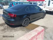 ✅ 2018 Volkswagen Jetta SE Sport • VIN: 3VWD17AJXJM241896 • Lot: 42727243. Listed on IAAI with 141,695 mi. Free auction sales archive from the USA and detailed vehicle history report at DreamBid. Image 4.