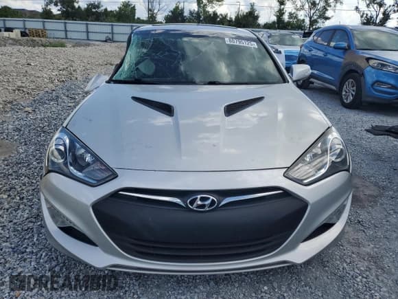✅ 2013 Hyundai Genesis Coupe Grand Touring • VIN: KMHHU6KJ3DU101026 • Lot: 80795125. Wystawiony na Copart z przebiegiem 74 977 mil. Bezpłatny archiwum sprzedaży aukcyjnych z USA i szczegółowy raport historii pojazdu na DreamBid. Zdjęcie 5.