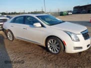 ✅ 2017 Cadillac XTS Luxury • VIN: 2G61M5S32H9163055 • Lot: 43631397. Listed on IAAI with 102,157 mi. Free auction sales archive from the USA and detailed vehicle history report at DreamBid. Image 1.