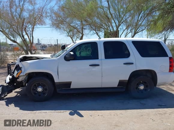 ✅ 2014 Chevrolet Tahoe Commercial • VIN: 1GNLC2E05ER210242 • Lot: 42818225. Wystawiony na IAAI z przebiegiem 161 337 mil. Bezpłatny archiwum sprzedaży aukcyjnych z USA i szczegółowy raport historii pojazdu na DreamBid. Zdjęcie 14.