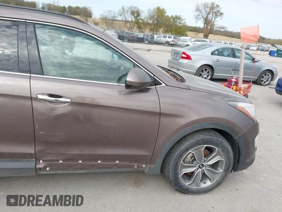 ✅ 2015 Hyundai Santa Fe GLS • VIN: KM8SMDHF4FU103061 • Лот: 43544205. Опубликован ранее на IAAI с пробегом 106 991 миль. Бесплатный доступ к архиву аукционных продаж из США и подробный отчёт об истории автомобиля на DreamBid. Изображение 18.