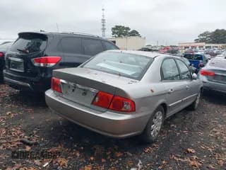 ✅ 2004 Kia Optima LX • VIN: KNAGD126945301866 • Лот: 40786358. Опубликован ранее на IAAI с пробегом 145 262 миль. Бесплатный доступ к архиву аукционных продаж из США и подробный отчёт об истории автомобиля на DreamBid. Изображение 4.