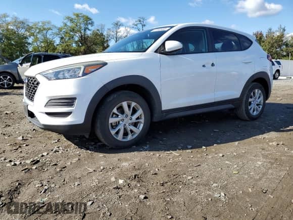 2019 Hyundai Tucson SE z VIN KM8J23A45KU869928, wystawiony jako Copart lot #87183485 z przebiegiem 42 648 mil mil oraz Szkoda całkowita • Salvage title. Historia ofert i sprzedaży dostępna na DreamBid. Obrazek 1.