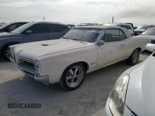 ✅ 1966 Pontiac GTO • VIN: 242676P246352 • Лот: 75298684. Опубликован ранее на Copart с пробегом 79 942 миль. Бесплатный доступ к архиву аукционных продаж из США и подробный отчёт об истории автомобиля на DreamBid. Изображение 1.