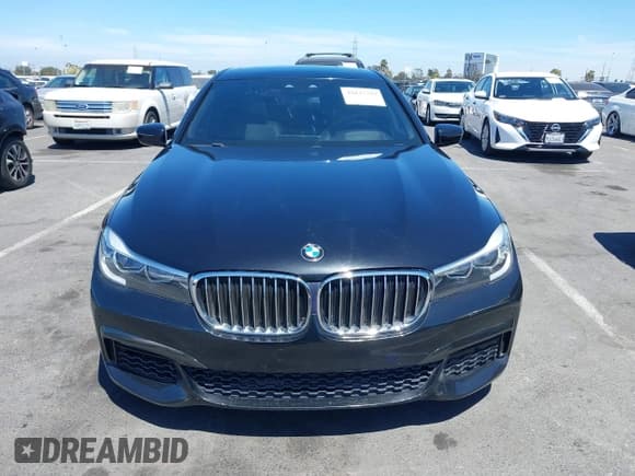 ✅ 2019 BMW 7 Series 740i • VIN: WBA7E2C55KB216529 • Lot: 42837792. Listed on IAAI with 81,573 mi. Free auction sales archive from the USA and detailed vehicle history report at DreamBid. Image 12.