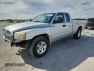 ✅ 2006 Dodge Dakota SLT • VIN: 1D7HE42K36S669084 • Лот: 70355415. Опубликован ранее на Copart с пробегом 226 451 миль. Бесплатный доступ к архиву аукционных продаж из США и подробный отчёт об истории автомобиля на DreamBid. Изображение 1.