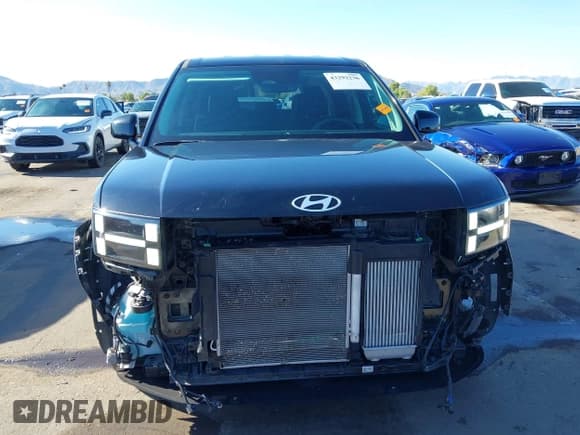 ✅ 2025 Hyundai Santa Fe SE • VIN: 5NMP14GL0SH106499 • Lot: 43292236. Listed on IAAI with 47,093 mi. Free auction sales archive from the USA and detailed vehicle history report at DreamBid. Image 13.