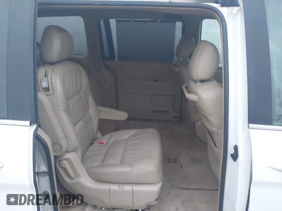 ✅ 2005 Honda Odyssey EX-L • VIN: 5FNRL38655B411556 • Lot: 43704042. Listed on IAAI with 205,713 mi. Free auction sales archive from the USA and detailed vehicle history report at DreamBid. Image 8.