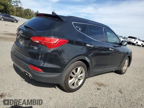 ✅ 2015 Hyundai Santa Fe • VIN: 5XYZW4LA0FG261682 • Лот: 39040654. Опубликован ранее на Copart с пробегом 59 175 миль. Бесплатный доступ к архиву аукционных продаж из США и подробный отчёт об истории автомобиля на DreamBid. Изображение 3.